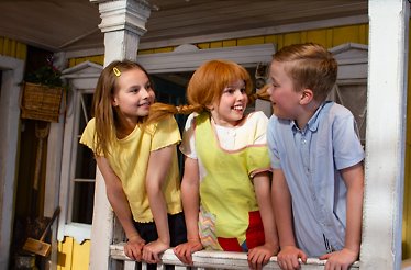 Pippi Longstocking with friends at her house Villa Villekulla.