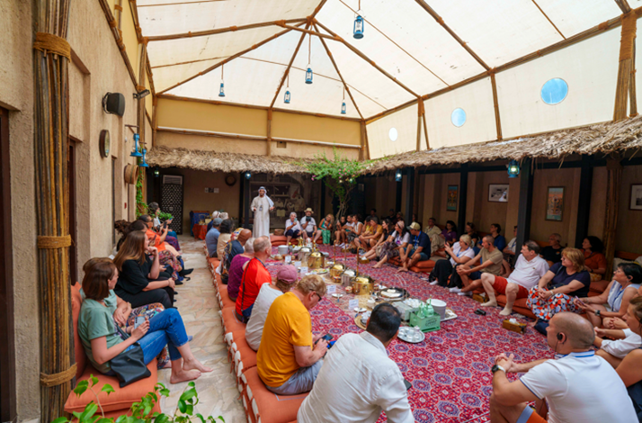 Guests gather for a cultural talk and traditional meal at House 26’s heritage courtyard