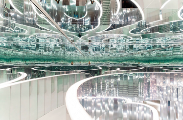 Es Devlin's Forest of Us mirrored maze installation inside Superblue Miami.