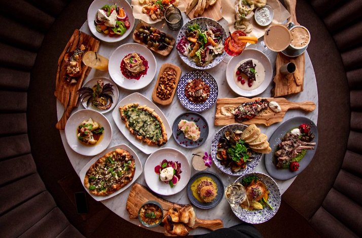 A spread of shareable Greek and Mediterranean dishes from Trade Boston.